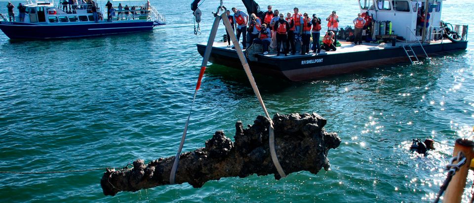 A one-ton cannon from the Queen Anne's Revenge shipwreck site is pulled from the water on October 26, 2011. (REUTERS/Karen Browning/N.C. Department of Cultural Resources)