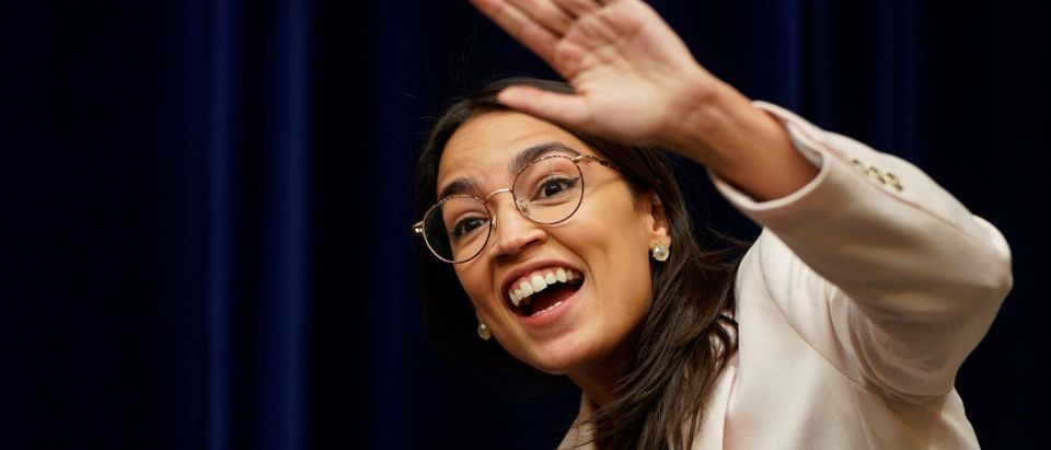 Rep. Alexandria Ocasio-Cortez waves before a hearing of the Civil Rights and Civil Liberties Subcommittee on "Confronting White Supremacy (Part I): The Consequences of Inaction" on Capitol Hill in Washington, U.S., May 15, 2019. REUTERS/Joshua Roberts