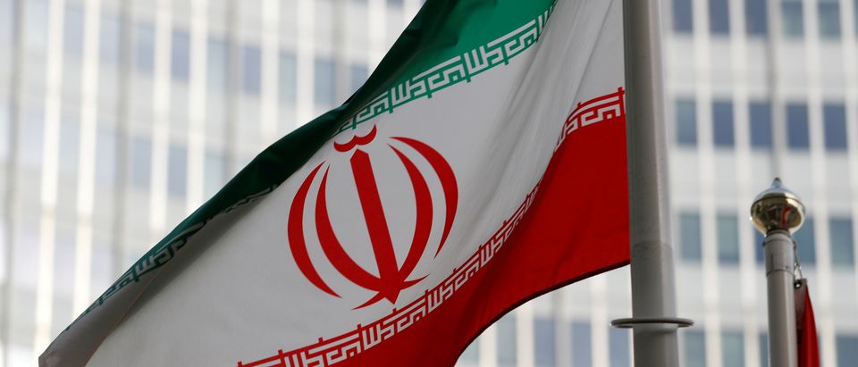 The Iranian flag flutters in front the International Atomic Energy Agency (IAEA) headquarters in Vienna, Austria March 4, 2019. REUTERS/Leonhard Foeger/File Photo