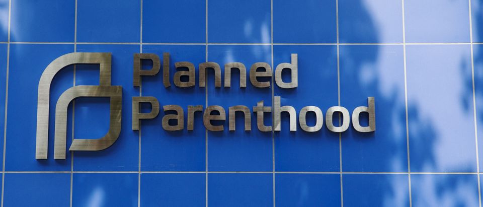 A sign is pictured at the entrance to a Planned Parenthood building in New York August 31, 2015. Picture taken August 31, 2015. To match Insight USA-PLANNEDPARENTHOOD/ REUTERS/Lucas Jackson/File Photo