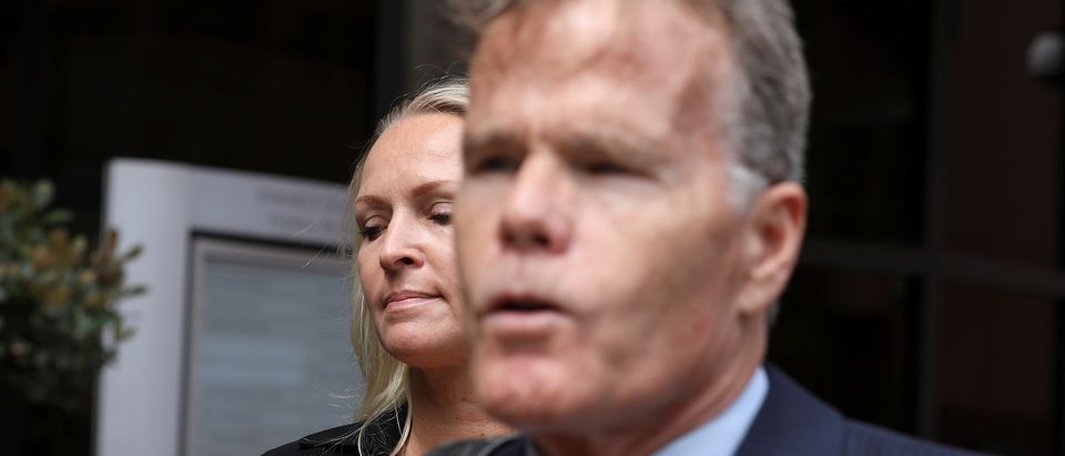U.S. Rep. Duncan Hunter's wife Margaret Hunter leaves the federal court with her attorney, Thomas McNamara, in San Diego, California, U.S., June 13, 2019. REUTERS/Earnie Grafton - RC14A5B3D9E0