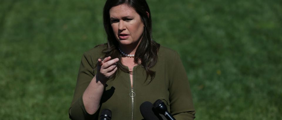 U.S. White House press secretary Sarah Huckabee Sanders speaks to the news media after giving an interview to Fox News outside of the White House in Washington, U.S. May 31, 2019. REUTERS/Leah Millis