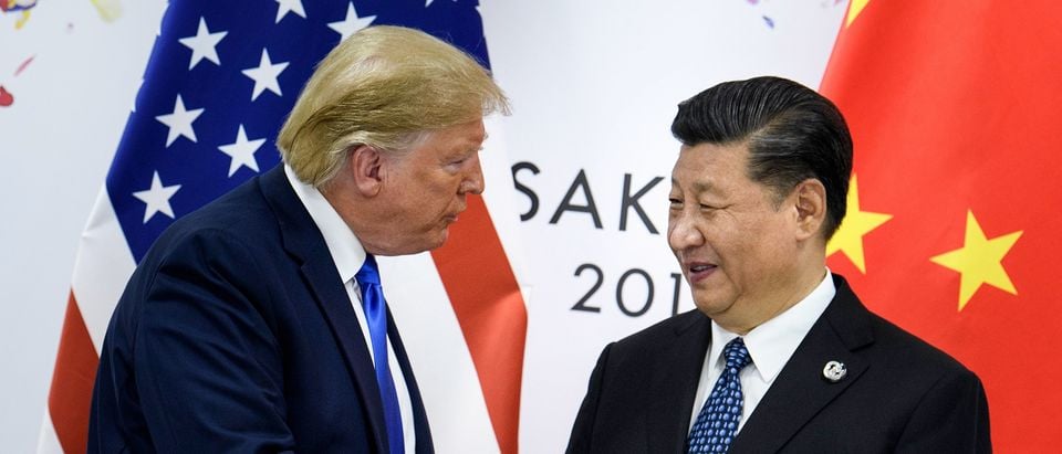 China's President Xi Jinping (R) shakes hands with US President Donald Trump before a bilateral meeting on the sidelines of the G20 Summit in Osaka on June 29, 2019. (BRENDAN SMIALOWSKI/AFP/Getty Images)