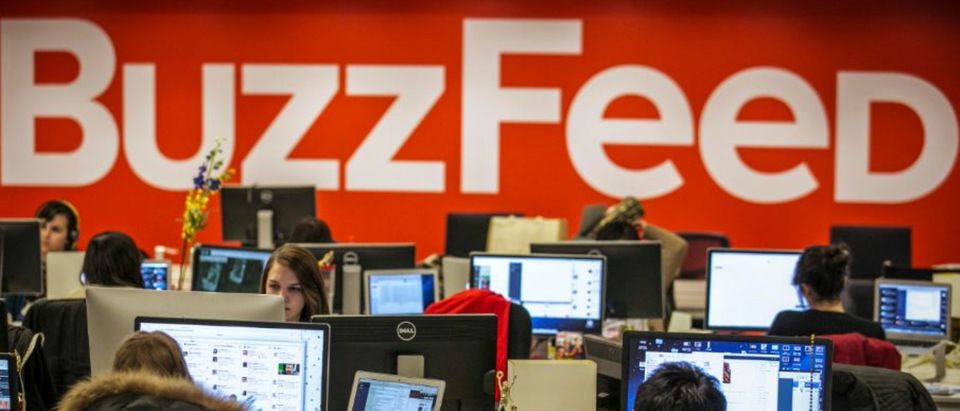 Buzzfeed employees work at the company's headquarters in New York January 9, 2014. REUTERS/Brendan McDermid/File Photo