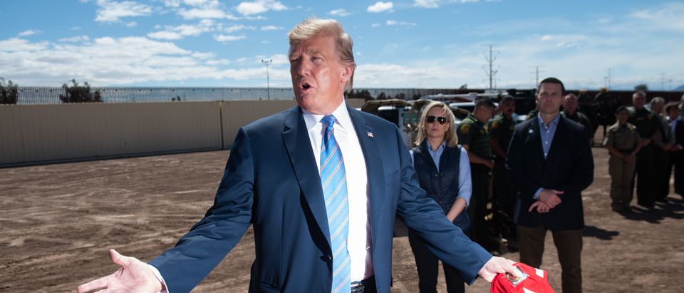 President Donald Trump tours the border wall between the United States and Mexico in Calexico, California on April 5, 2019. (Saul Loeb/AFP/Getty Images)