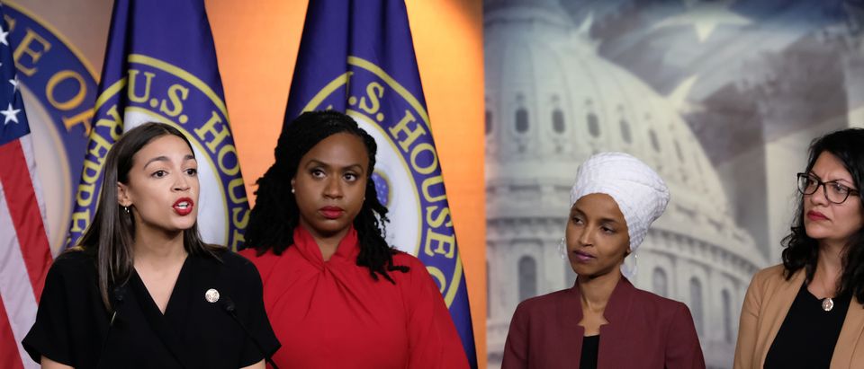 (L-R) U.S. Rep. Alexandria Ocasio-Cortez speaks as Reps. Ayanna Pressley, Ilhan Omar and Rashida Tlaib listen during a news conference at the U.S. Capitol on July 15, 2019 in Washington, D.C. (Photo by Alex Wroblewski/Getty Images)