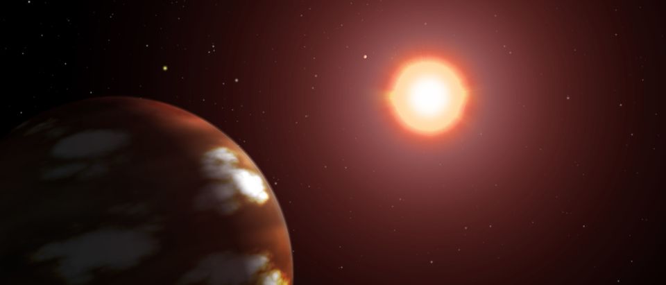 Illustration of a Neptune-sized plaent orbiting the M dwarf star Gliese 436 (Illustration by NASA via Getty Images)