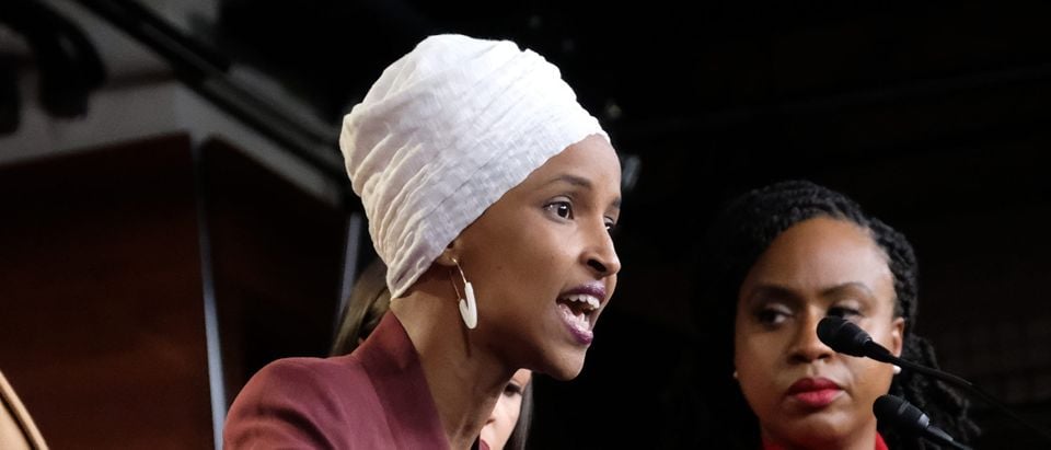 U.S. Rep. Ilhan Omar speaks as Reps. Ayanna Pressley and Rashida Tlaib listen during a news conference at the US Capitol on July 15, 2019 in Washington, D.C. (Photo by Alex Wroblewski/Getty Images)