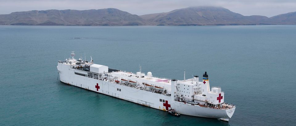The hospital ship USNS Comfort (T-AH 20) is anchored off the coast of Callao, Peru, on July 8, 2019. (U.S. Navy photo by Mass Communication Specialist 2nd Class Morgan K. Nall)