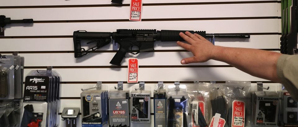 BENSON, AZ - SEPTEMBER 29: Gun shop owner Jeff Binkley displays AR-15 "Sport" rifles at Sarge's Sidearms on September 29, 2016 in Benson, Arizona. He said he redesigned and renamed his store just this year. Gun shops are proliferate in Arizona, which regulates and restricts weapons less than anywhere in the United States. (Photo by John Moore/Getty Images)