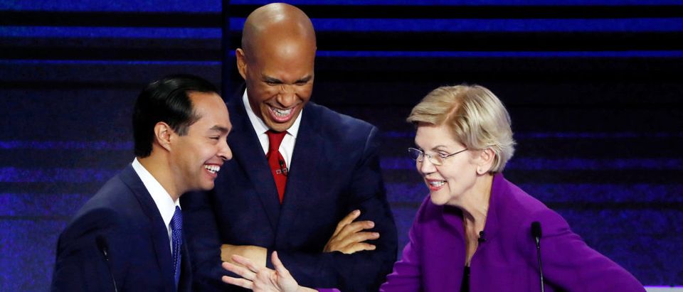 Candidates chat during a break at the first U.S. 2020 presidential election Democratic candidates debate in Miami, Florida, U.S.,
