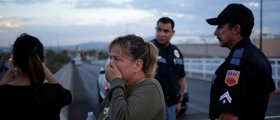 A woman reacts after a mass shooting at a Walmart in El Paso, Texas, Aug. 3, 2019. (REUTERS/Jose Luis Gonzalez)