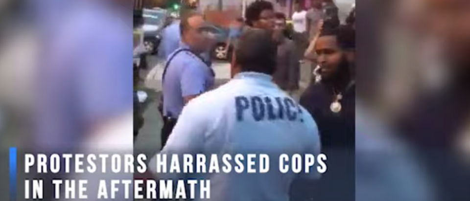 Screen Shot:Protesters Harass Cops After Philadelphia Shooting:Youtube:The Daily Caller:Screen Shot