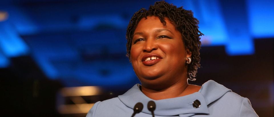 Stacey Abrams speaks to the crowd of supporters announcing they will wait till the morning for results of the mid-terms election at the Hyatt Regency in Atlanta, Georgia, U.S. November 7, 2018. REUTERS/Lawrence Bryant