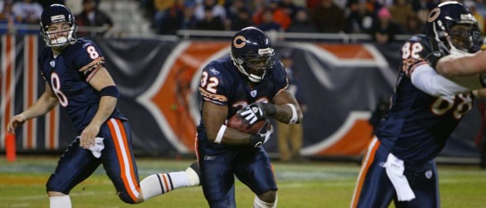 CHICAGO, IL- DECEMBER 31: Cedric Benson #32 of the Chicago Bears runs with the ball during a game against the Green Bay Packers on December 31, 2006 at Soldier Field in Chicago, Illinois. (Photo by Sporting News via Getty Images via Getty Images)