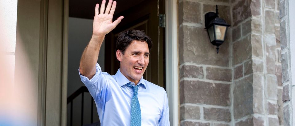 FILE PHOTO: Canada's Prime Minister Justin Trudeau waves to supporters after speaking at an election campaign stop in Brampton