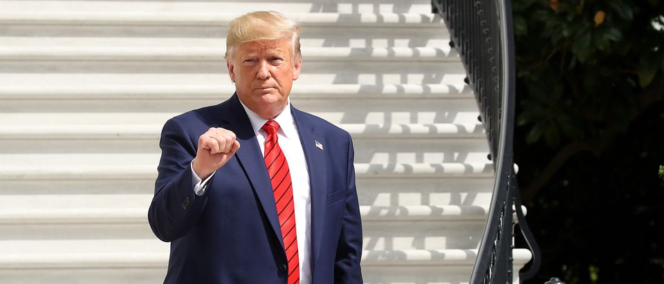 U.S. President Donald Trump gestures as he returns to the White House after attending the United Nations General Assembly on Sept. 26, 2019 in Washington, D.C. (Photo by Mark Wilson/Getty Images)