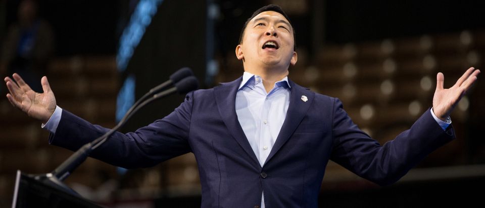 Democratic presidential candidate, entrepreneur Andrew Yang reacts as he goes on stage during the New Hampshire Democratic Party Convention at the SNHU Arena on September 7, 2019 in Manchester, New Hampshire. (Photo by Scott Eisen/Getty Images)