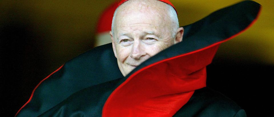 Wind blows U.S. Cardinal Theodore McCarrick's mantle as he arrives for a meeting at the Vatican with bishops and heads of episcopal conferences 15 October 2003. (Photo: PATRICK HERTZOG/AFP/Getty Images)
