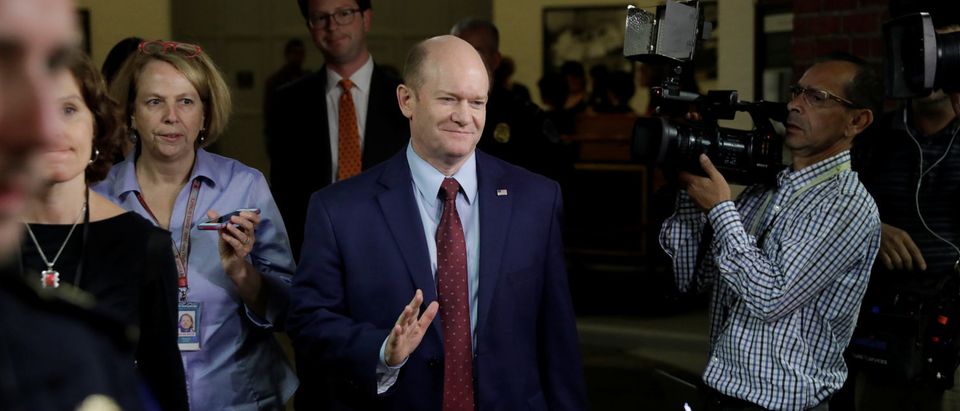 Senator Coons departs after reading FBI report into Kavanaugh assault allegations on Capitol Hill in Washington