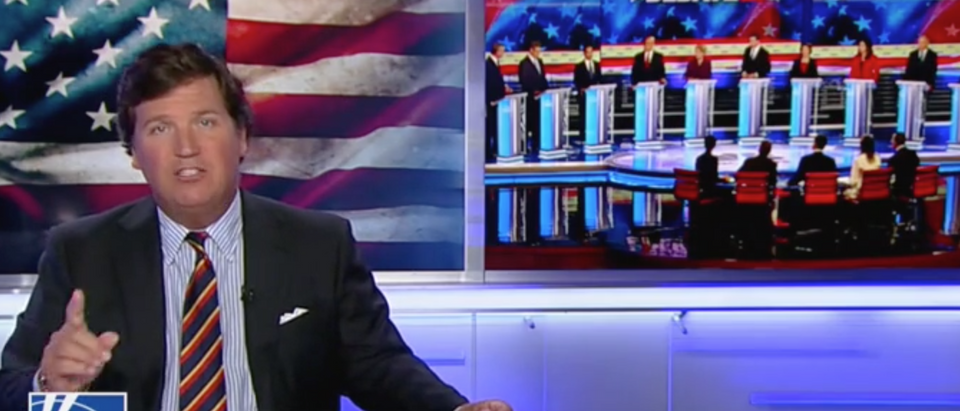 Tucker Carlson hosts his show on Fox News. Screen Shot/Fox News