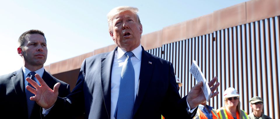 FILE PHOTO: U.S. President Trump visits a section of the U.S.-Mexico border wall in Otay Mesa