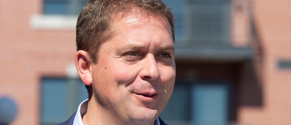 Conservative Party leader Andrew Scheer speaks to the media during a campaign stop in Sainte-Hyacinthe