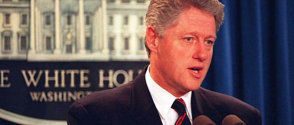 U.S. President Bill Clinton speaks 27 July at a brief press conference to address the bomb blast that ripped through Atlanta's Olympic Centennial Park early 27 July, killing at least two and injuring 110. t the 1996 Olympics. (Photo: STRINGER/AFP via Getty Images)