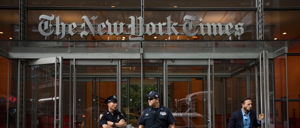 Members of the New York City Police Department stand outside the headquarters of The New York Times, June 28, 2018 in New York City. (Drew Angerer/Getty Images)