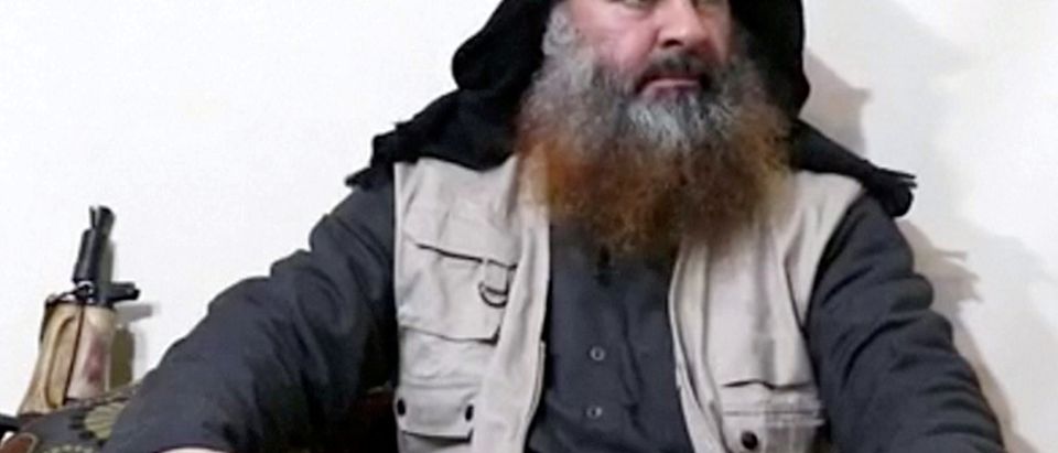 Bearded man with IS leader al-Baghdadi's appearance speaks in this screen grab taken from video