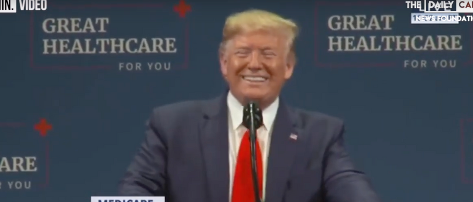 Trump jokes with a person in the crowd about the "lock her up" chant. (Screenshot the Daily Caller News Foundation)