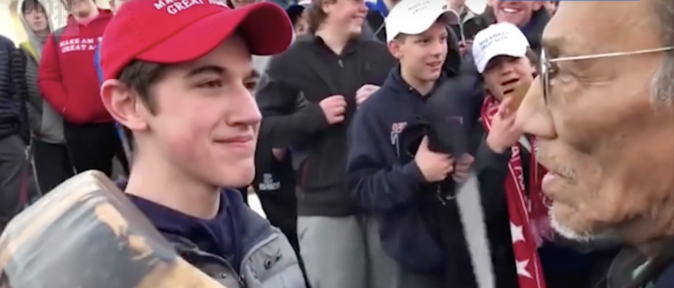 Nicholas Sandmann in front of Nathan Phillips in January. (Screenshot Youtube The Washington Post)