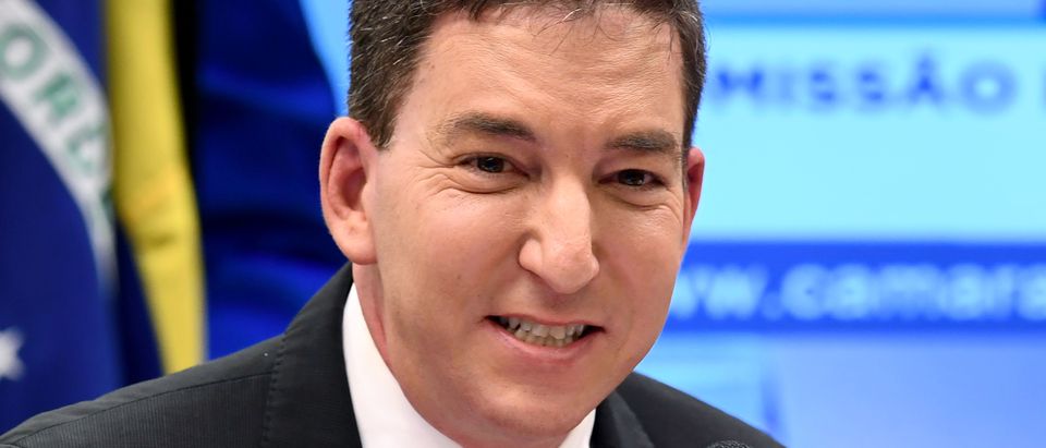 US journalist Glenn Greenwald, founder and editor of The Intercept website gestures during a hearing at the Lower House's Human Rights Commission in Brasilia, Brazil, on June 25, 2019. - The Intercept has been publishing alleged conversations between Justice Minister and former judge Sergio Moro and prosecutors of Operation Lava Jato, which would have been hacked from their mobile phones. (Photo by EVARISTO SA / AFP) (Photo credit should read EVARISTO SA/AFP via Getty Images)