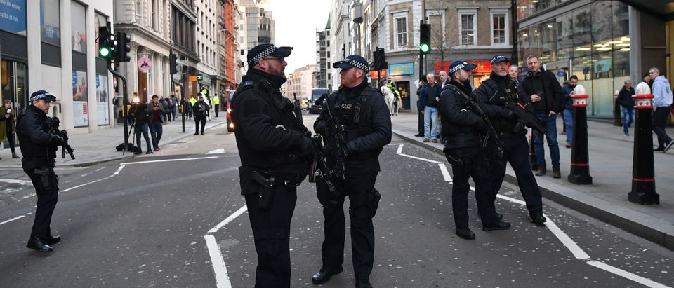 Armed policman stand guard at Cannon Street station in central London, on Nov. 29, 2019 after reports of shots being fired on London Bridge. (BEN STANSALL/AFP via Getty Images)