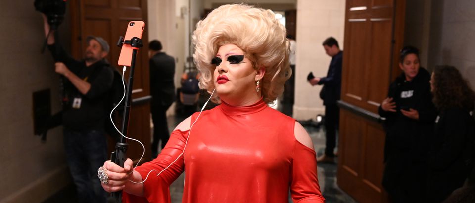 A drag queen attends the House Intelligence Committee hearing on the Trump impeachment inquiry on Capitol Hill in Washington