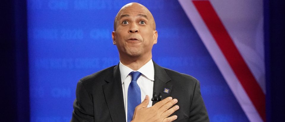 LOS ANGELES, CALIFORNIA - OCTOBER 10: Democratic presidential candidate Sen. Cory Booker (D-NJ) gestures at the Human Rights Campaign Foundation and CNN’s presidential town hall, focused on LGBTQ issues, on October 10, 2019 in Los Angeles, California. It is the first Presidential event broadcast on a major news network focused on LGBTQ issues. (Photo by Mario Tama/Getty Images)