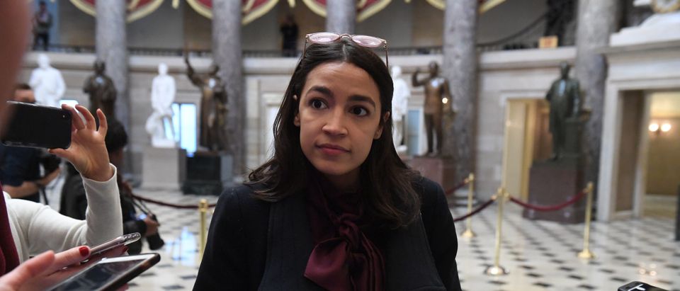 Rep. Alexandria Ocasio-Cortez(D-NY) talks with reporters at the US Capitol, as the House readies for a historic vote on December 18, 2019 in Washington, DC. (SAUL LOEB/AFP via Getty Images)