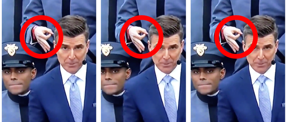 Cadet flashes the "okay" symbol during the Army-Navy game. (Screenshot Twitter Video @Kokomothegreat, The Daily Caller)
