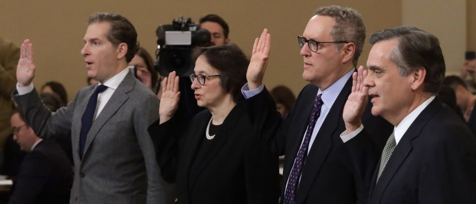 Constitutional scholars (L-R) Noah Feldman of Harvard University, Pamela Karlan of Stanford University, Michael Gerhardt of the University of North Carolina, and Jonathan Turley of George Washington University are sworn in prior to testifying before the House Judiciary Committee in the Longworth House Office Building on Capitol Hill December 4, 2019 in Washington, DC. This is the first hearing held by the House Judiciary Committee in the impeachment inquiry against U.S. President Donald Trump, whom House Democrats say held back military aid for Ukraine while demanding it investigate his political rivals. The Judiciary Committee will decide whether to draft official articles of impeachment against President Trump to be voted on by the full House of Representatives. (Photo by Alex Wong/Getty Images)