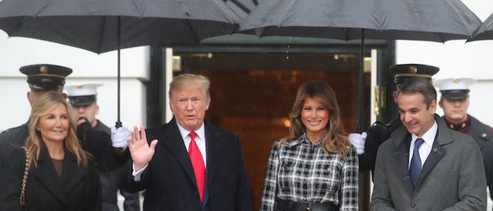 U.S. President Donald Trump and first lady Melania Trump welcome Greek Prime Minister Kyriakos Mitsotakis and Mareva Grabowski-Mitsotakis as they arrive at the White House in Washington, U.S., January 7, 2020. REUTERS/Jonathan Ernst