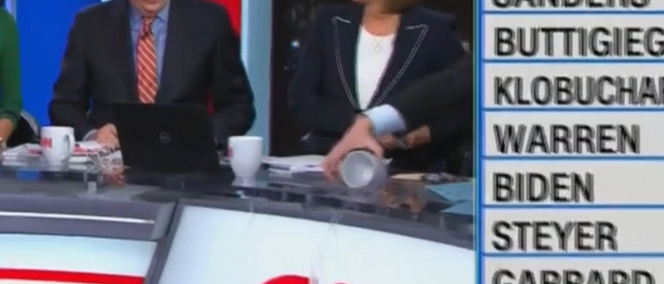 Anderson Cooper spills water on live tv (CNN screengrab)