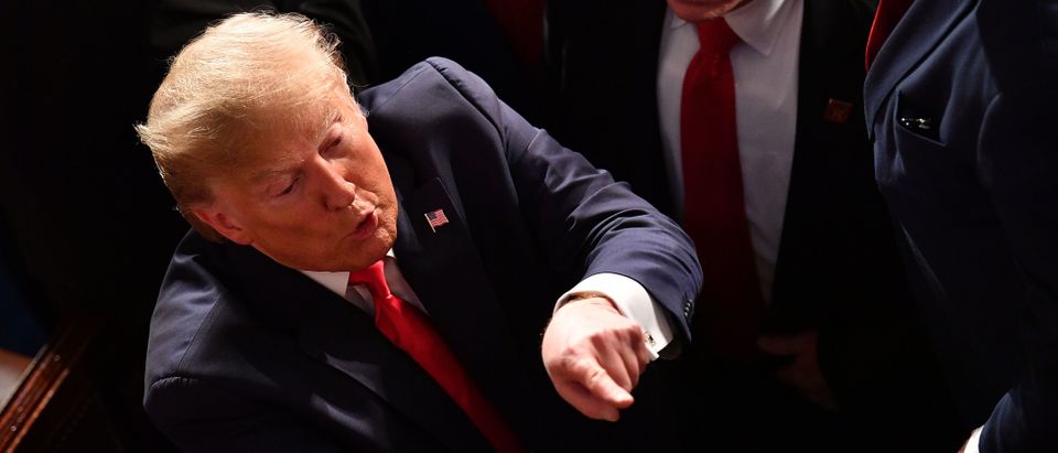 US President Donald Trump gestures after delivering the State of the Union address at the US Capitol in Washington, DC, on February 4, 2020. (Photo by MANDEL NGAN/AFP via Getty Images)