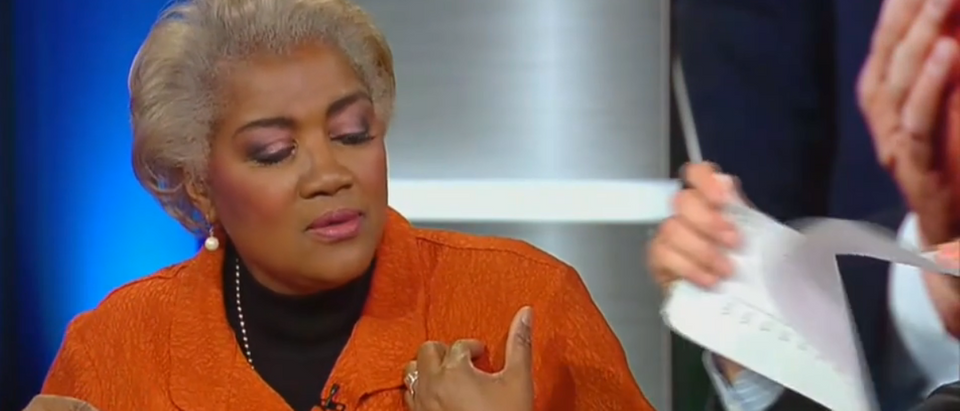 Jesse Watters rips up Donna Brazille's papers (Fox News screengrab)