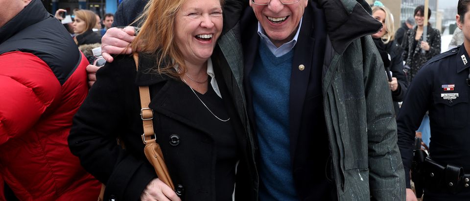 MANCHESTER, NEW HAMPSHIRE - FEBRUARY 11: Democratic presidential candidate Sen. Bernie Sanders (I-VT) and his wife, Jane Sanders, walk together after greeting people campaigning for him outside of a polling station on February 11, 2020 in Manchester, New Hampshire. Mr. Sanders awaits the results of the votes for the first-in-the-nation New Hampshire primary. (Photo by Joe Raedle/Getty Images)