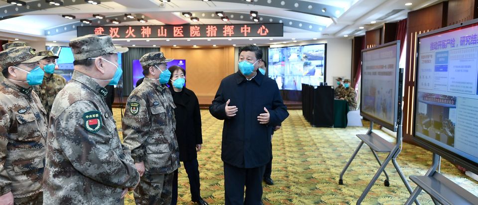 Chinese President Xi learns about the hospital's operations, treatment of patients, protection for medical workers and scientific research at the Huoshenshan Hospital in Wuhan