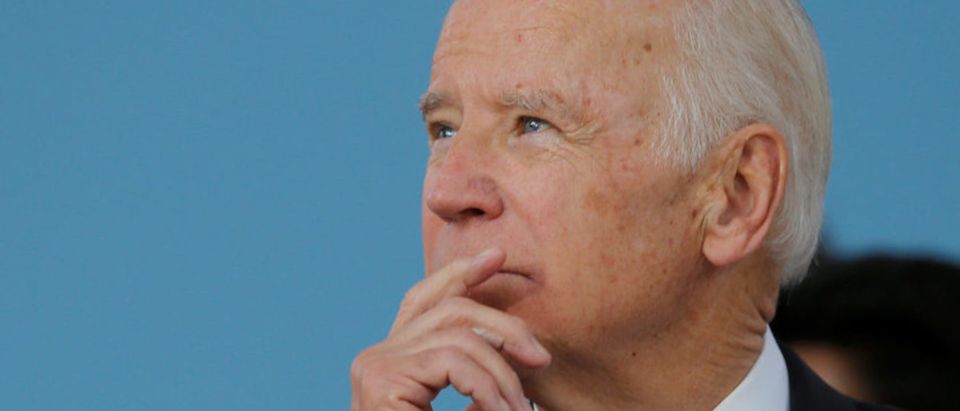 Former U.S. Vice President Joe Biden listens during Class Day Exercises at Harvard University in Cambridge