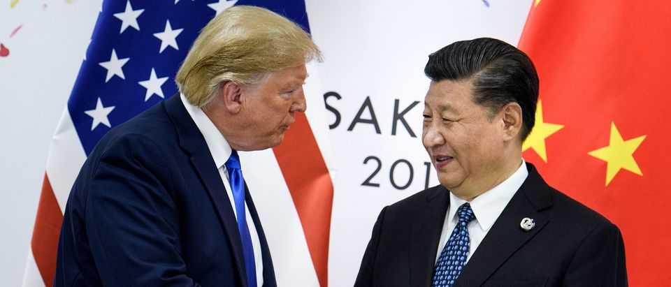 June 28, 2019 — China's President Xi Jinping (R) shakes hands with US President Donald Trump before a bilateral meeting on the sidelines of the G20 Summit in Osaka. - From the Arab Spring to bloodletting in Syria, from Obama to Trump, from terror in the streets of Paris to Brexit, the 2010s began with hope for a more equitable world, and end with a slide towards nationalistic populism. (Photo by BRENDAN SMIALOWSKI/AFP via Getty Images)