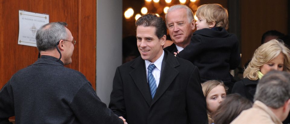 U.S. Vice President Joe Biden and his son Hunter Biden depart after a pre-inauguration church service in Washington, U.S., January 18, 2009. Picture taken January 18, 2009. REUTERS/Jonathan Ernst