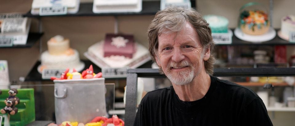 Baker Jack Phillips poses in his Masterpiece Cakeshop in Lakewood