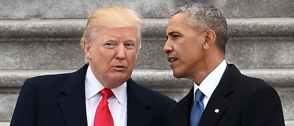 President Donald Trump and former President Barack Obama talk on the East front steps of the US Capitol after inauguration ceremonies on January 20, 2017 in Washington, DC. (ROBYN BECK/AFP via Getty Images)